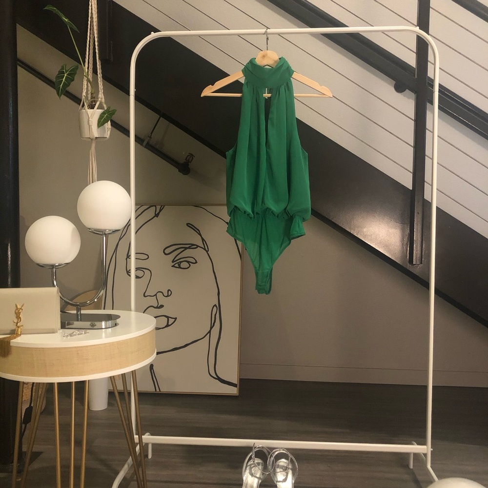 Green bodysuite.